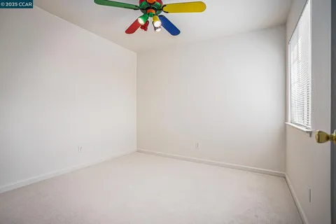 a view of a house with a yard and garage