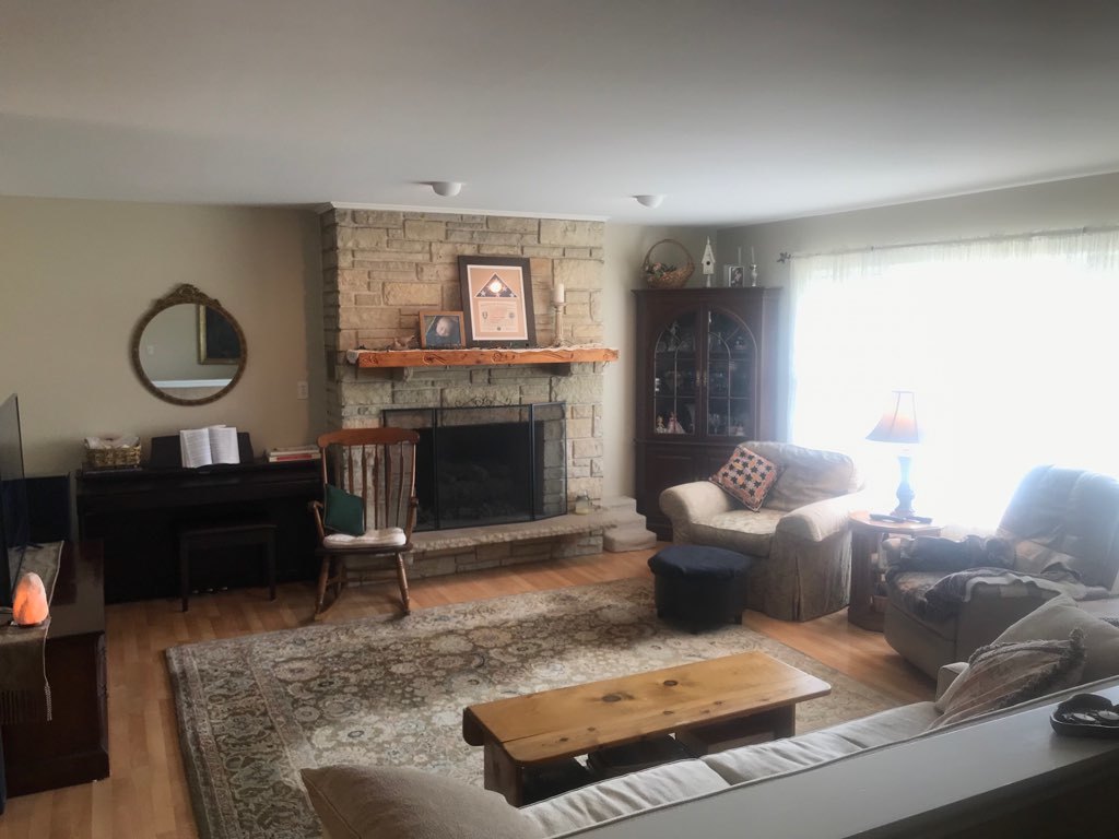9-n087 Corron Road Elgin, IL 60124 - Photo 2 of 12 a living room with furniture and a fireplace