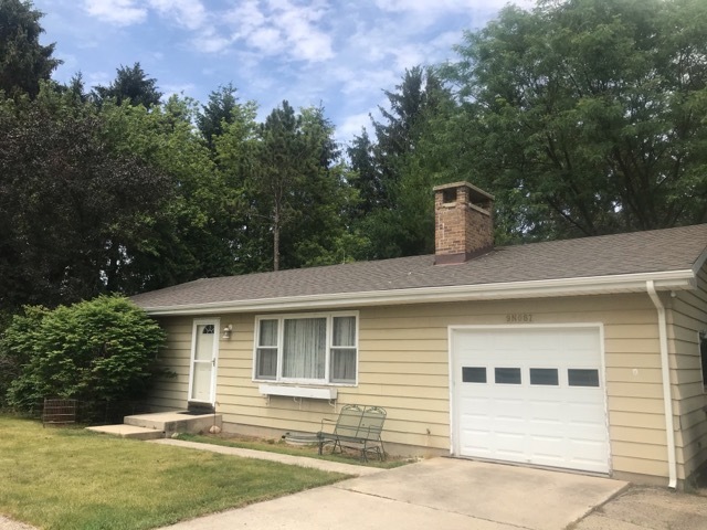9-n087 Corron Road Elgin, IL 60124 - Photo 12 of 12 a front view of a house with a yard