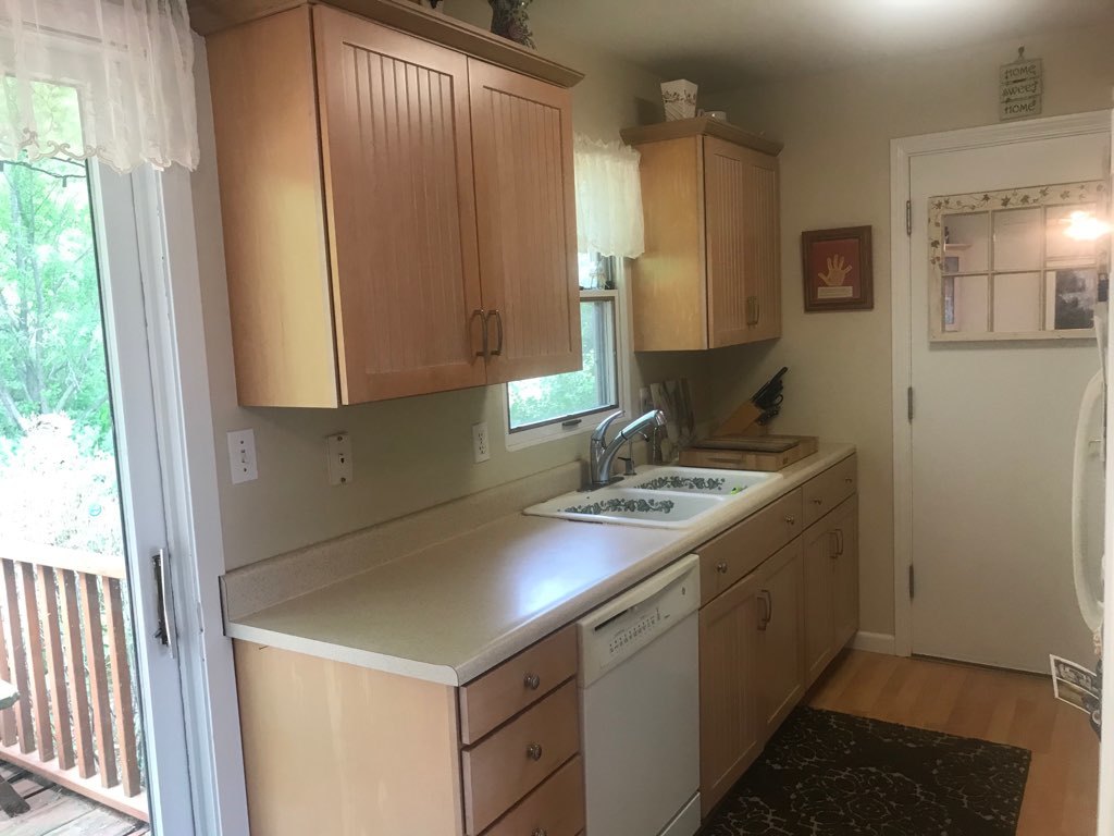 9-n087 Corron Road Elgin, IL 60124 - Photo 4 of 12 a kitchen with a sink and a refrigerator