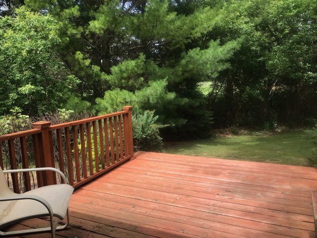 9-n087 Corron Road Elgin, IL 60124 - Photo 7 of 12 a balcony with wooden floor