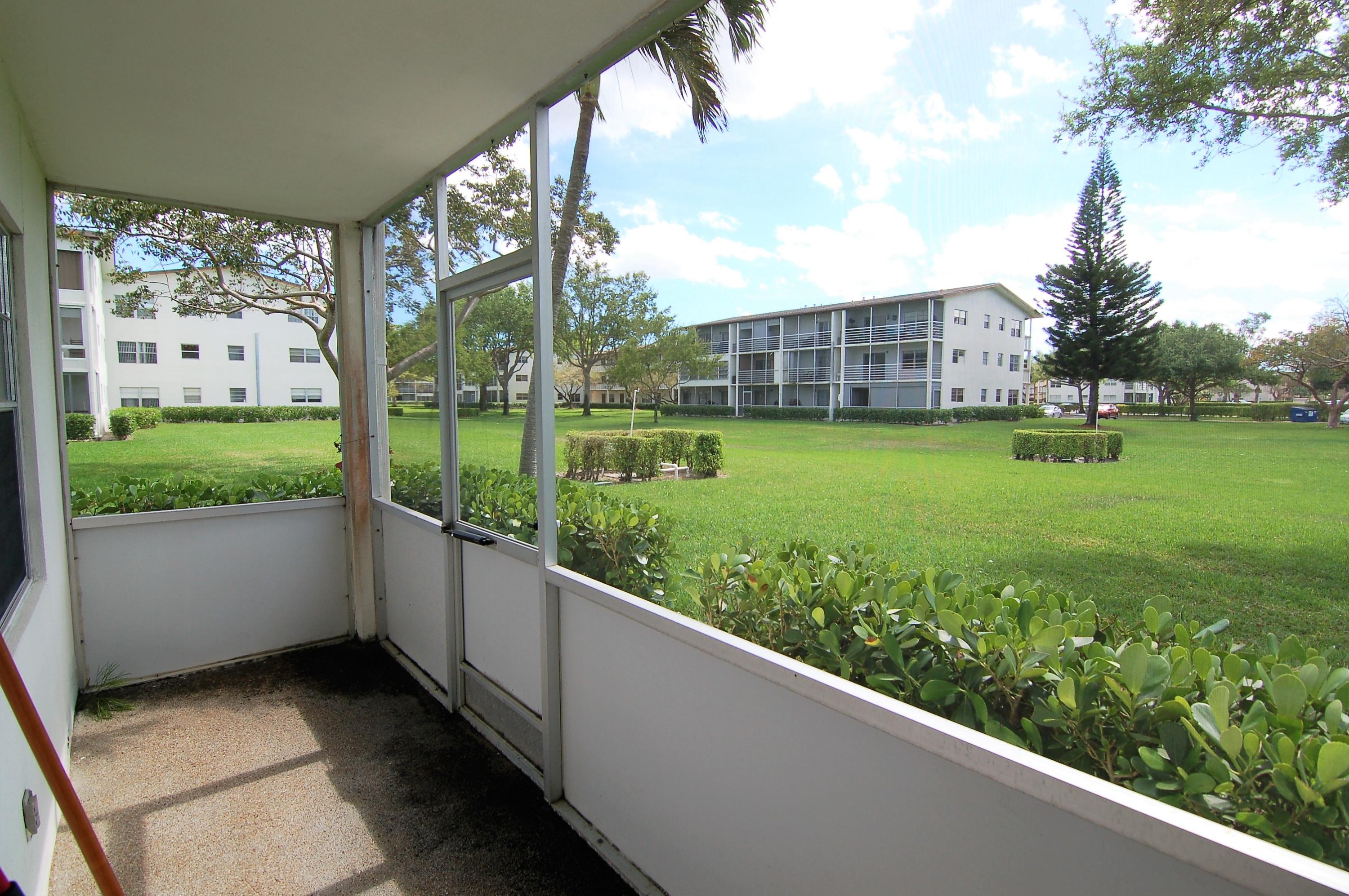 547 Mansfield M, Unit 547 Boca Raton, FL 33434 - Photo 18 of 25 CREENED PATIO