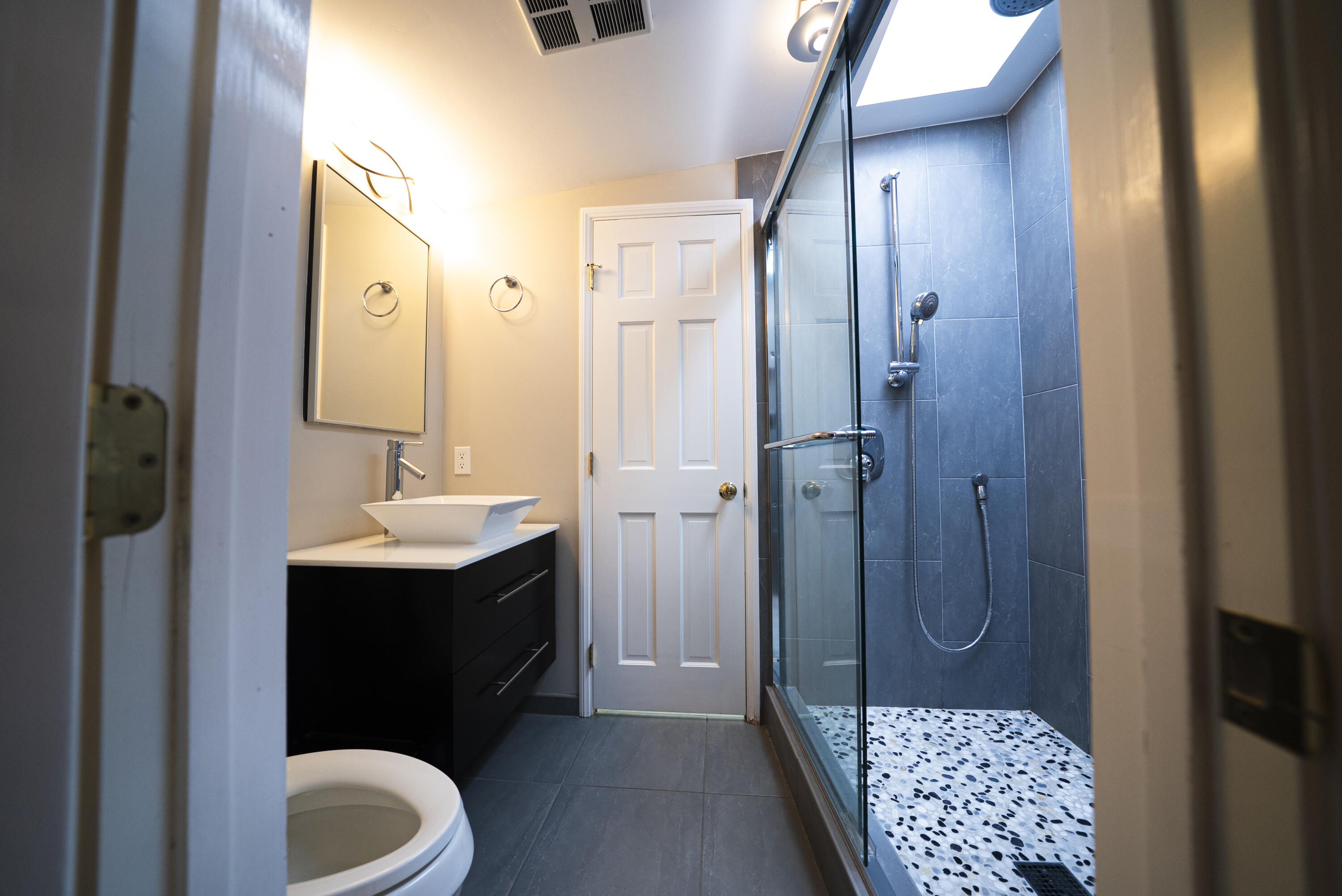 704 Ladera Lane Santa Barbara, CA 93108 - Photo 15 of 20 a bathroom with a sink a toilet and shower