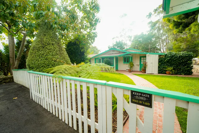 a view of swimming pool with small yard