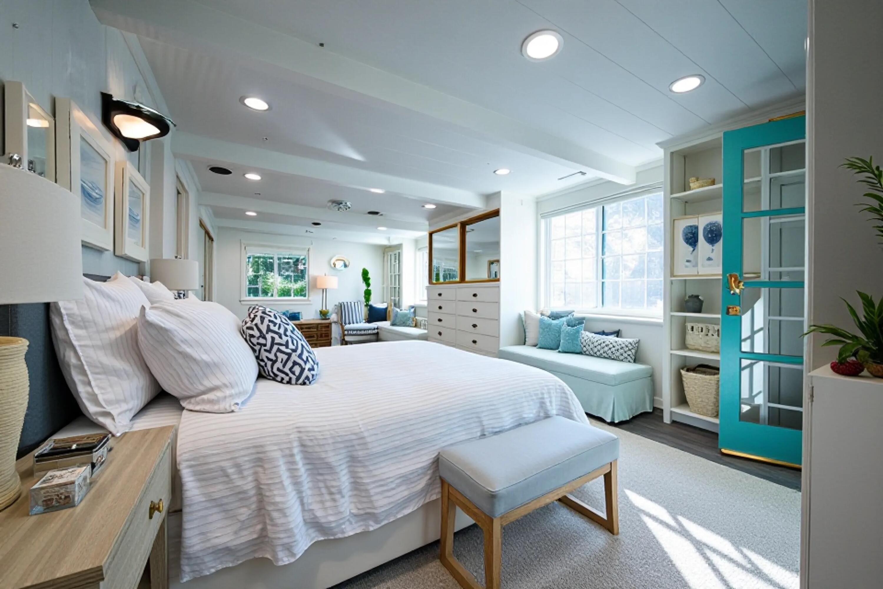 704 Ladera Lane Santa Barbara, CA 93108 - Photo 6 of 20 a bedroom with a bed and wooden floor