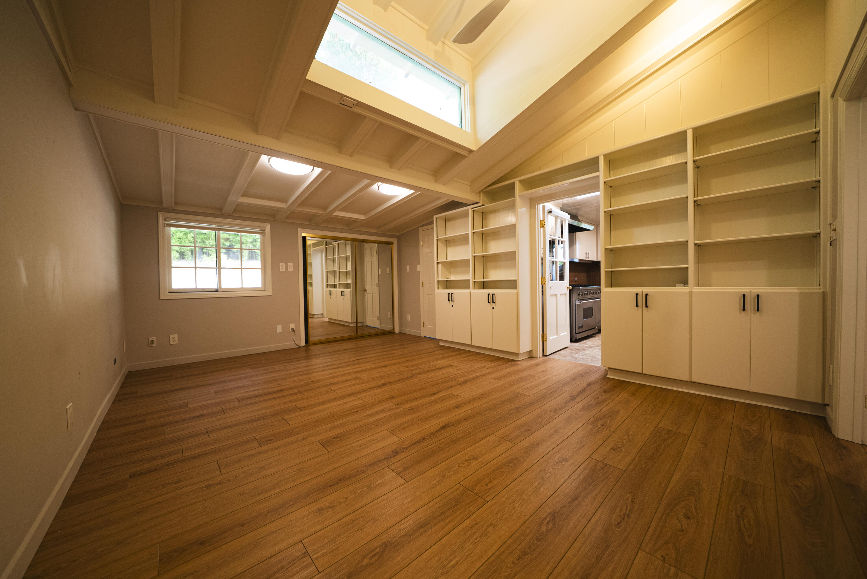 704 Ladera Lane Santa Barbara, CA 93108 - Photo 9 of 20 an empty room with closet and wooden floors