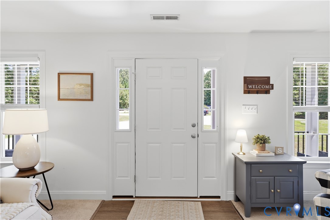 222 Oak Ridge Court Aylett, VA 23009 - Photo 6 of 35 Entryway featuring a paneled door with sidelights,