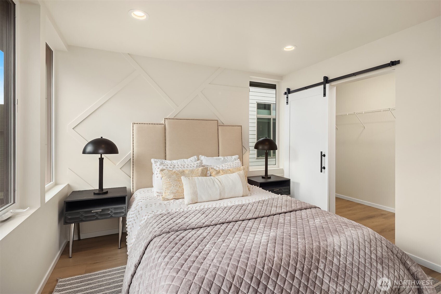 1514 Northwest 63rd Street, Unit B Seattle, WA 98107 - Photo 16 of 20 a bedroom with a bed and a table