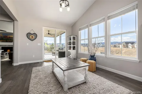 a living room with furniture and window