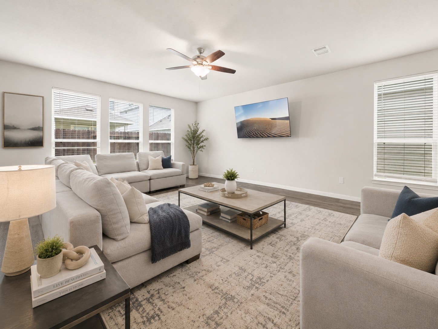 22210 Imperious Parkway Houston, TX 77073 - Photo 10 of 23 a living room with furniture and a flat screen tv