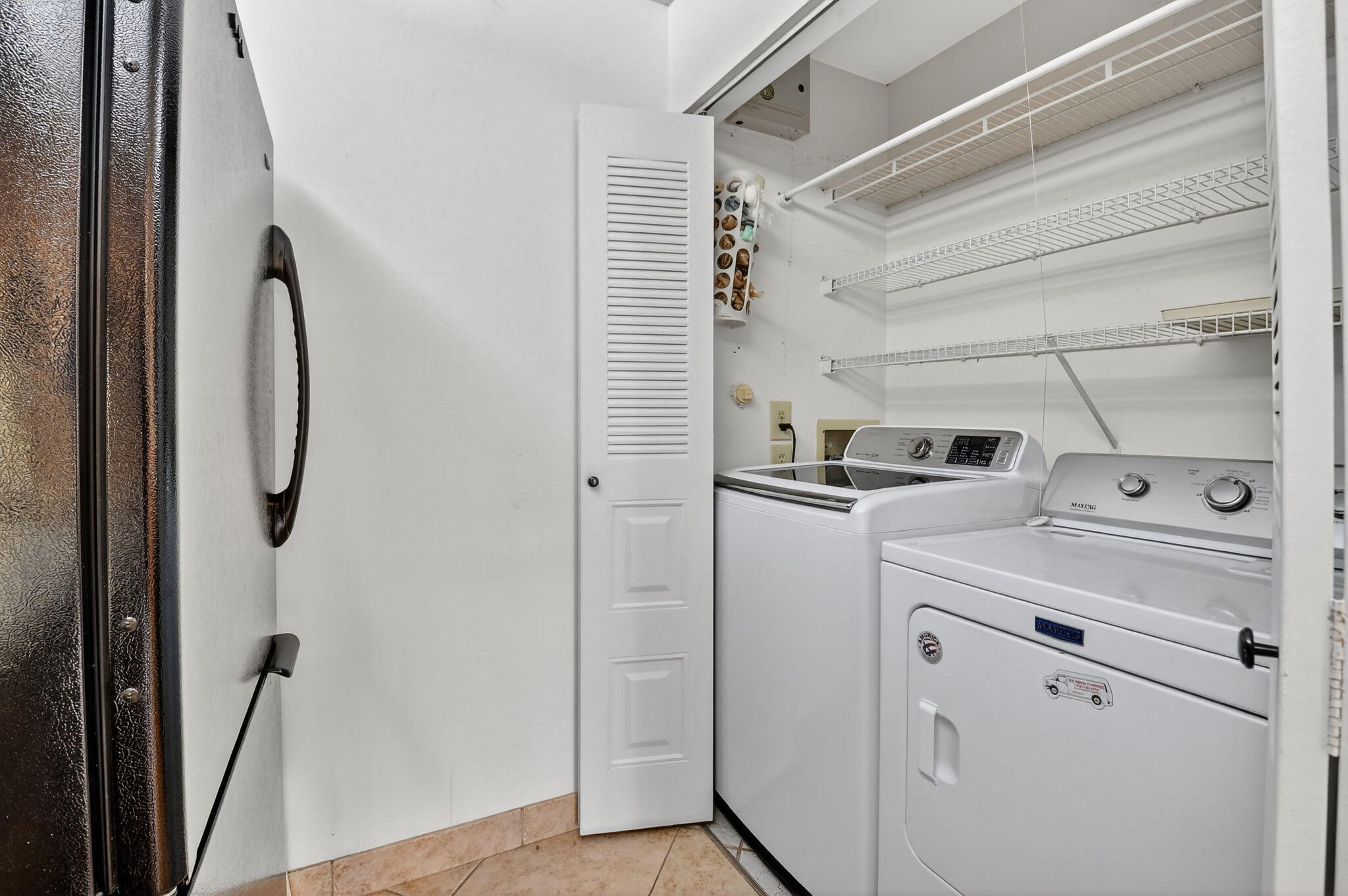 5775 Wanda Lane Delray Beach, FL 33484 - Photo 13 of 73 a utility room with dryer and washer