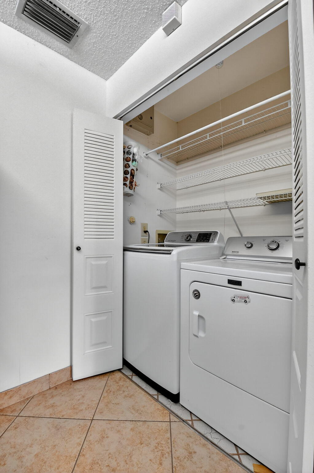 5775 Wanda Lane Delray Beach, FL 33484 - Photo 14 of 73 a utility room with dryer and washer