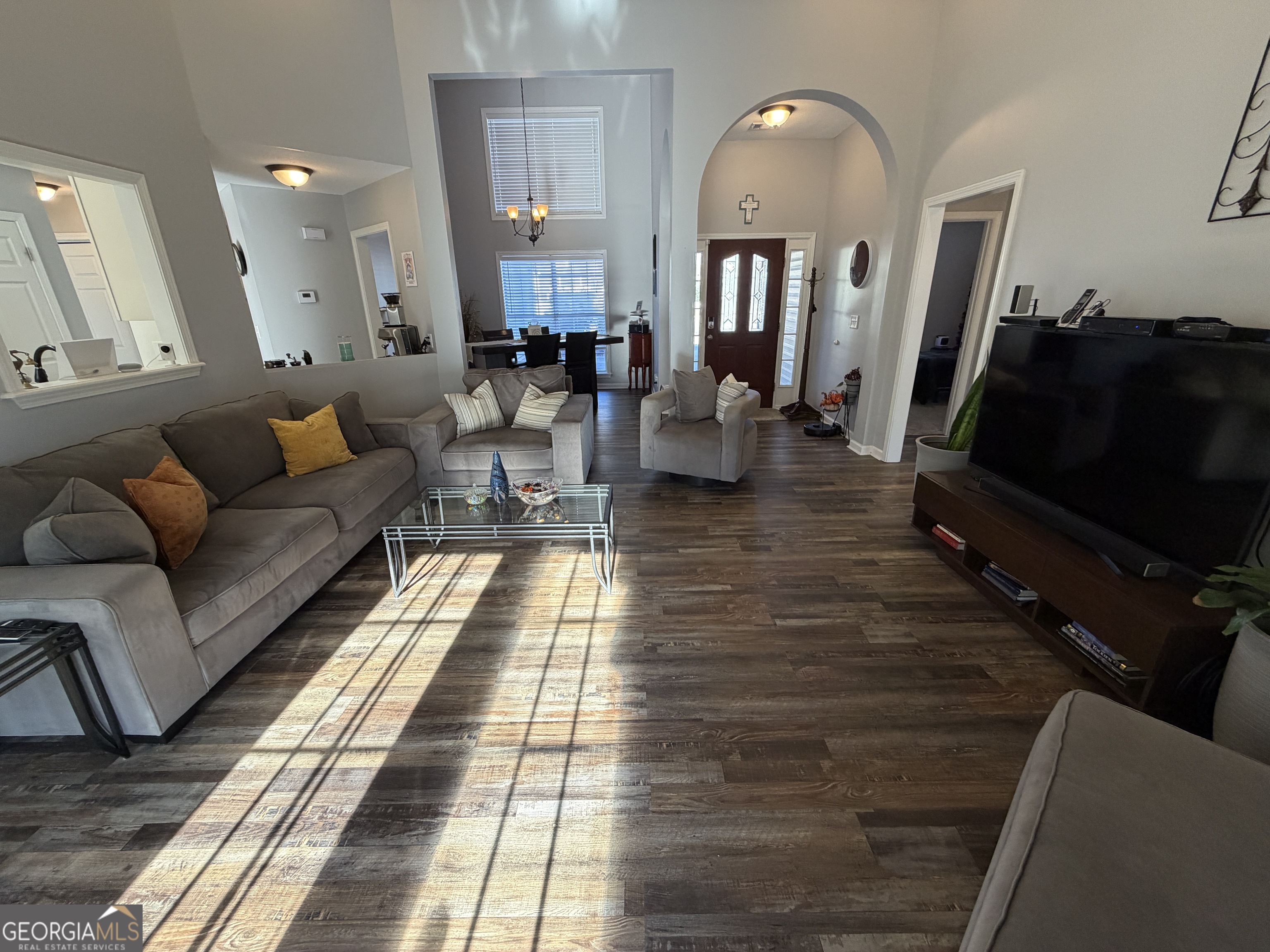 107 Westchester Circle Dublin, GA 31021 - Photo 12 of 22 a living room with furniture and a flat screen tv