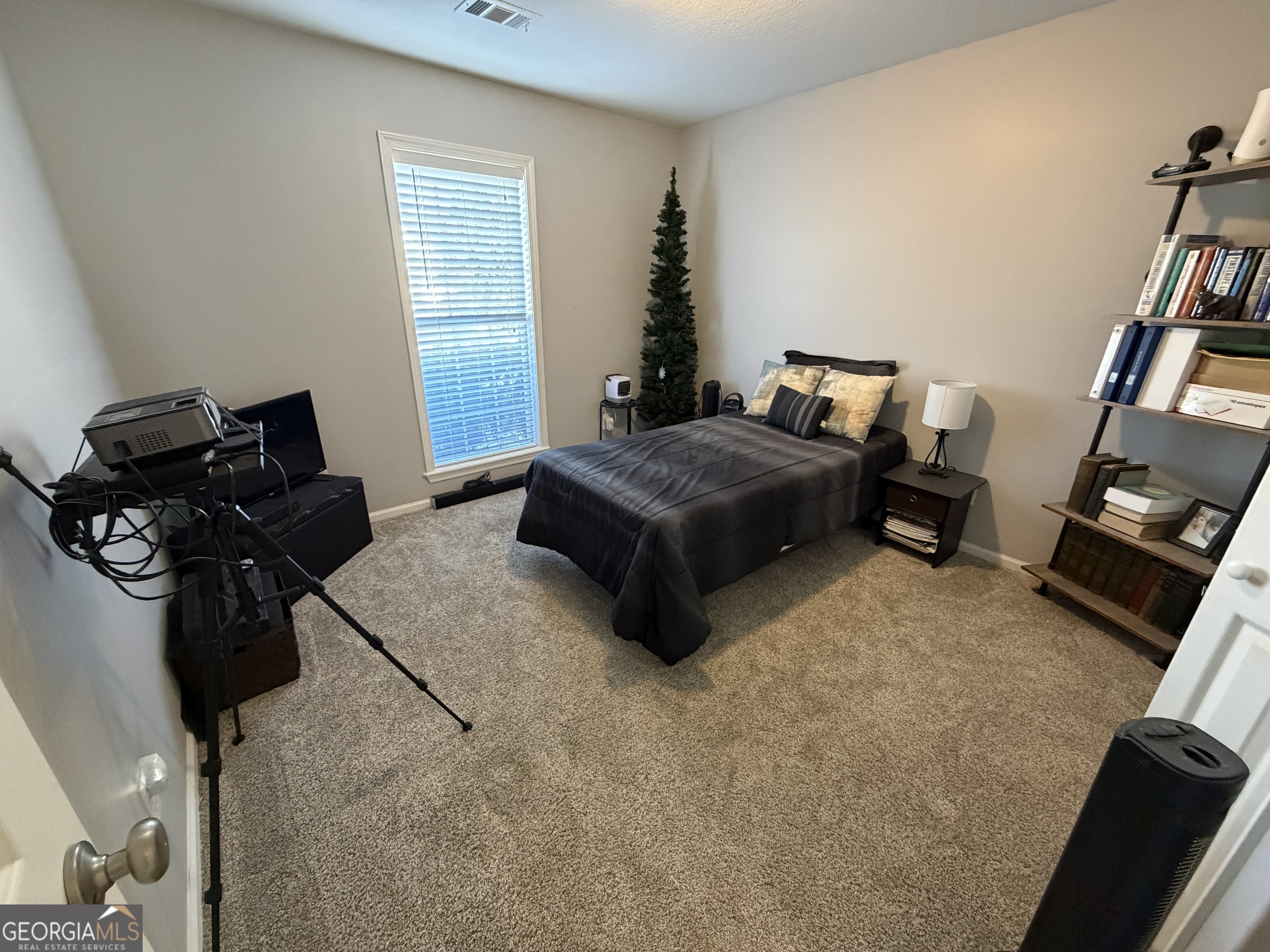 107 Westchester Circle Dublin, GA 31021 - Photo 14 of 22 a living room with furniture and a flat screen tv