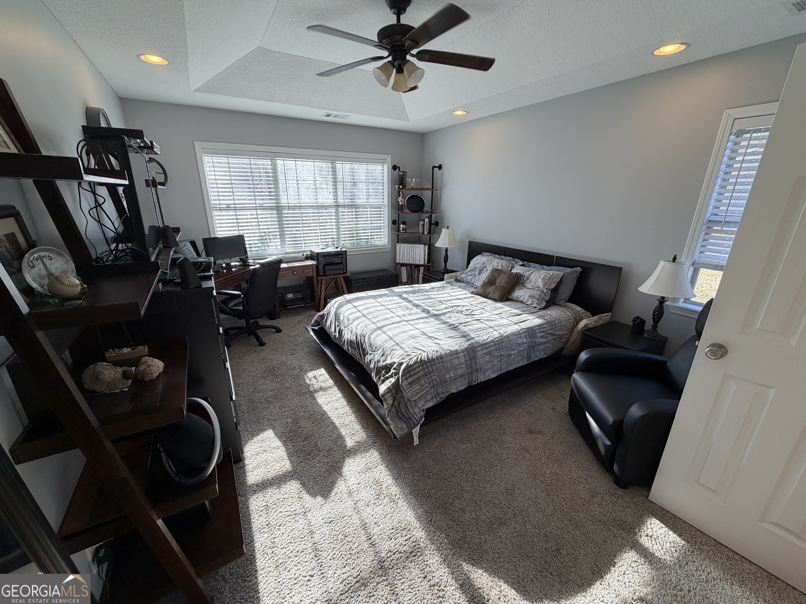 107 Westchester Circle Dublin, GA 31021 - Photo 17 of 22 a bedroom with a bed window and dresser