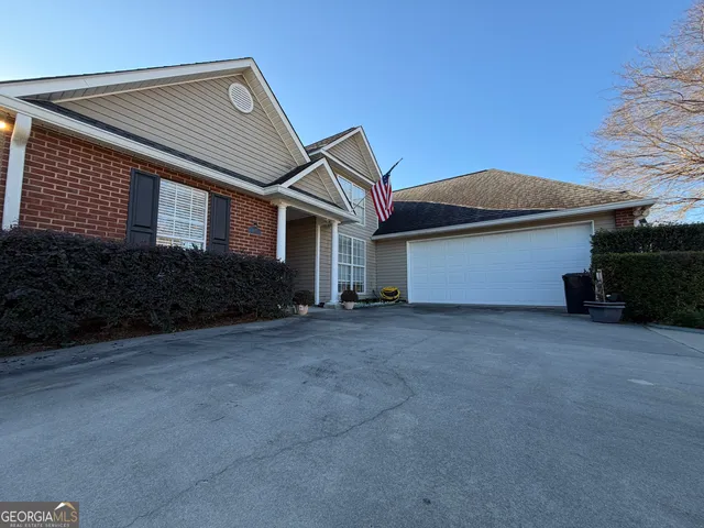 a living room with furniture or couch and a fireplace