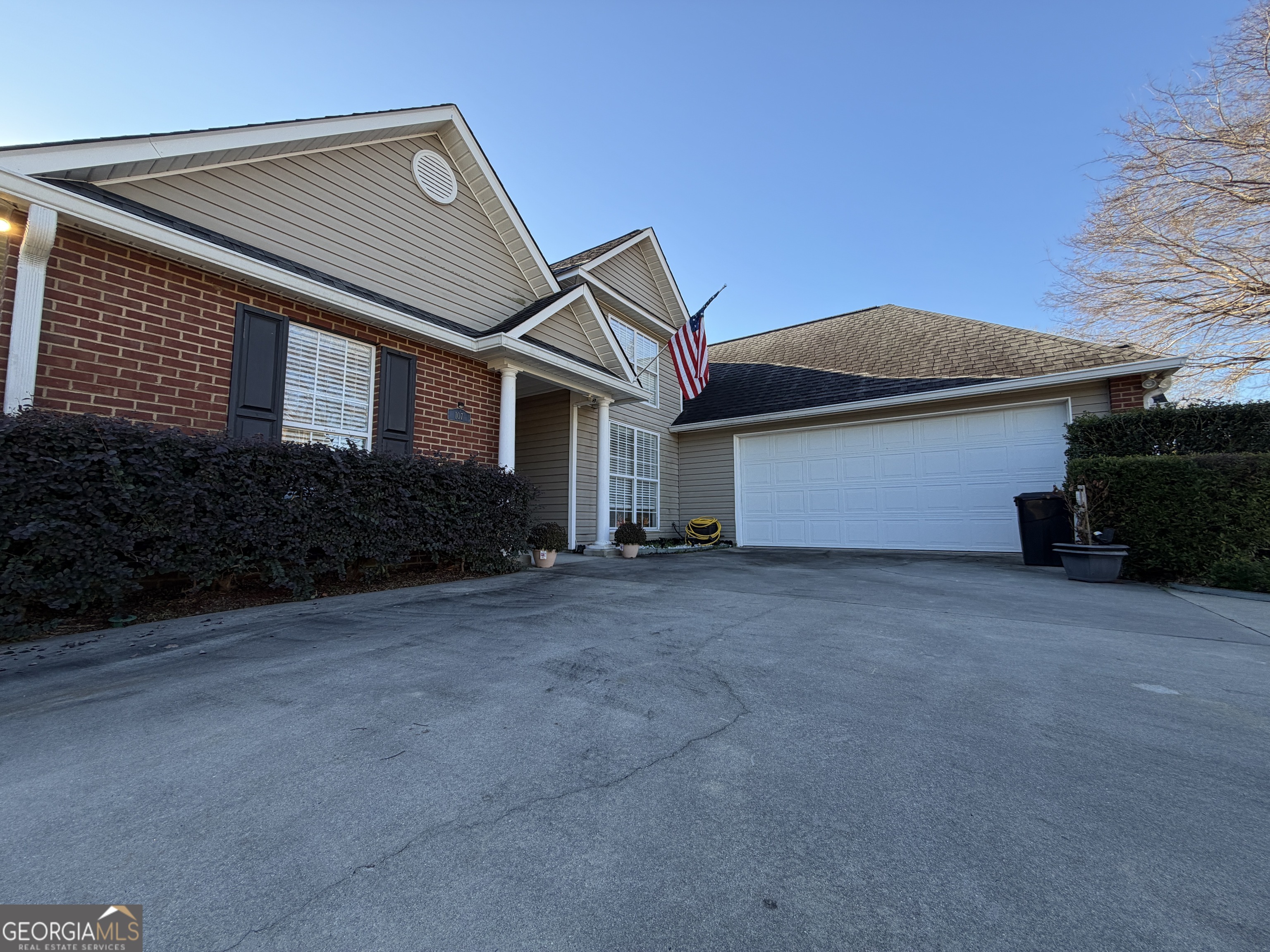 107 Westchester Circle Dublin, GA 31021 - Photo 5 of 22 a house view with a garden space