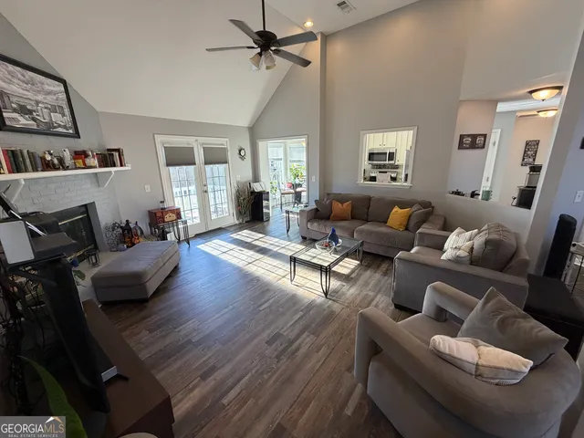 a view of a dining room with furniture and window