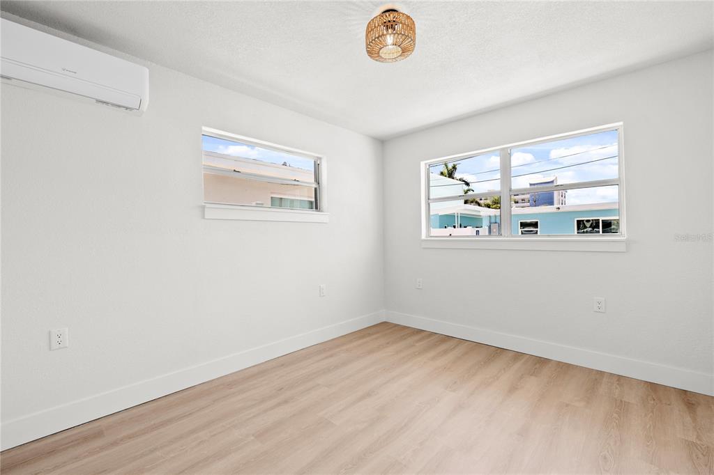 13388 1st Street East Madeira Beach, FL 33708 - Photo 24 of 28 an empty room with a window