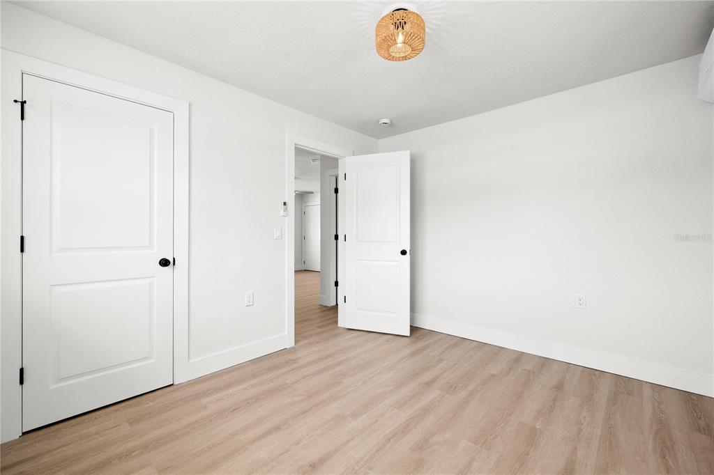 13388 1st Street East Madeira Beach, FL 33708 - Photo 26 of 28 a view of an empty room