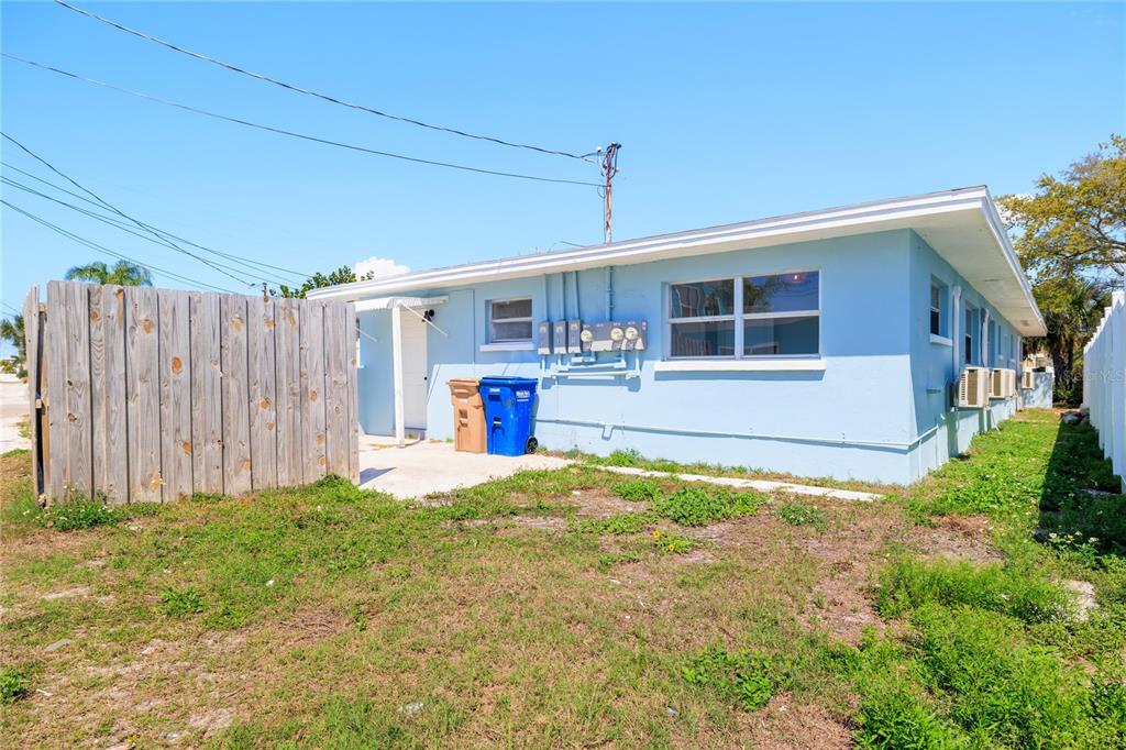 13388 1st Street East Madeira Beach, FL 33708 - Photo 28 of 28 a view of a house with backyard and sitting area