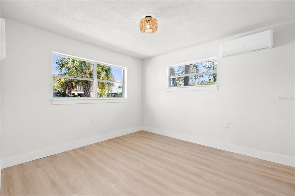 13388 1st Street East Madeira Beach, FL 33708 - Photo 9 of 28 an empty room with a window