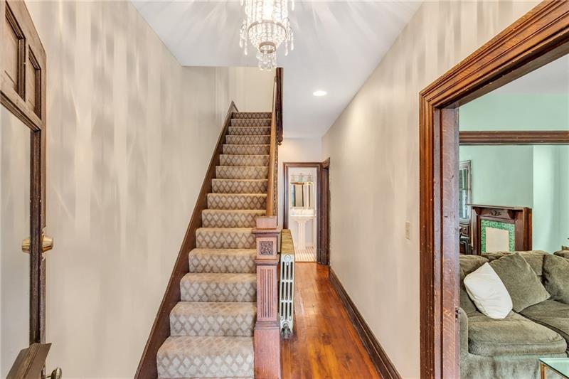 1416 Evergreen Road Pittsburgh, PA 15209 - Photo 3 of 25 The impressive entry greets you with refinished hardwood floors and updated light fixtures!