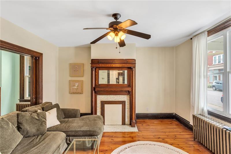 1416 Evergreen Road Pittsburgh, PA 15209 - Photo 4 of 25 Living room with decorative fireplace