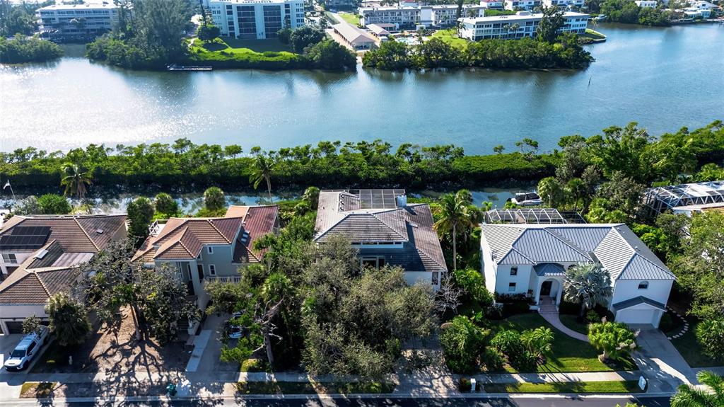 3361 Bayou Sound Longboat Key, FL 34228 - Photo 11 of 41 an aerial view of house with yard and lake view