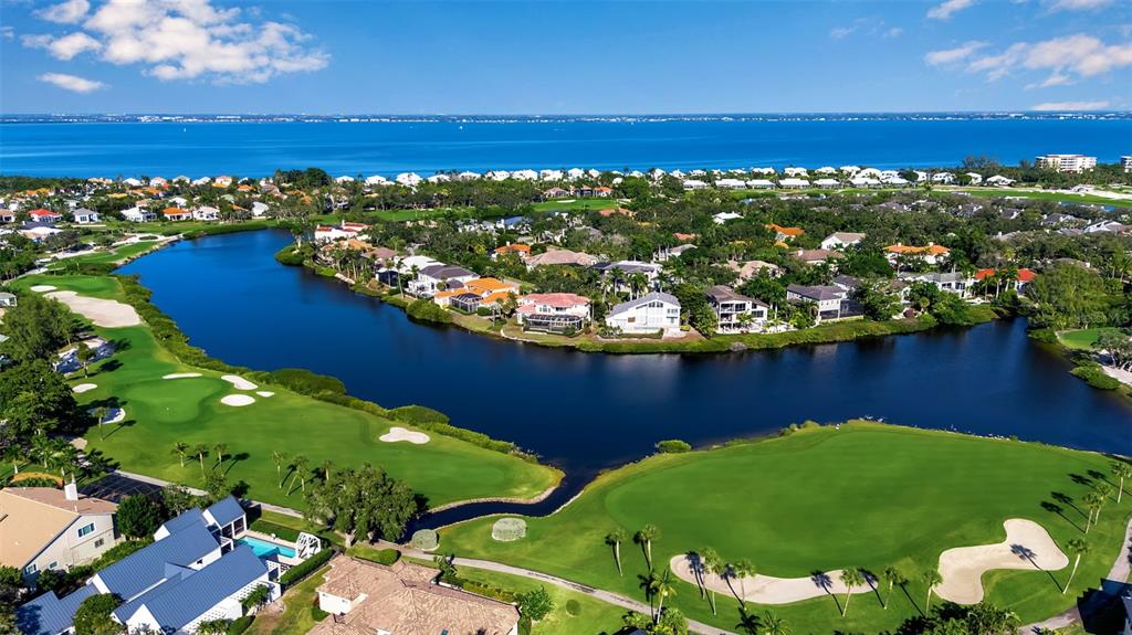 3361 Bayou Sound Longboat Key, FL 34228 - Photo 27 of 41 a view of a lake with a house