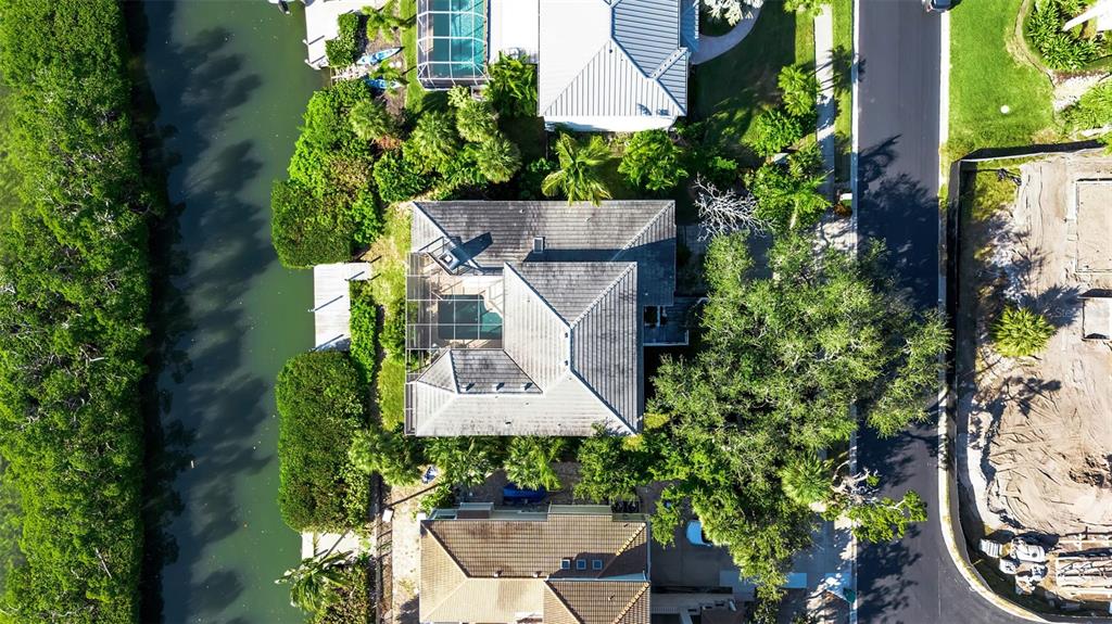 3361 Bayou Sound Longboat Key, FL 34228 - Photo 28 of 41 an aerial view of a house with garden space and swimming pool
