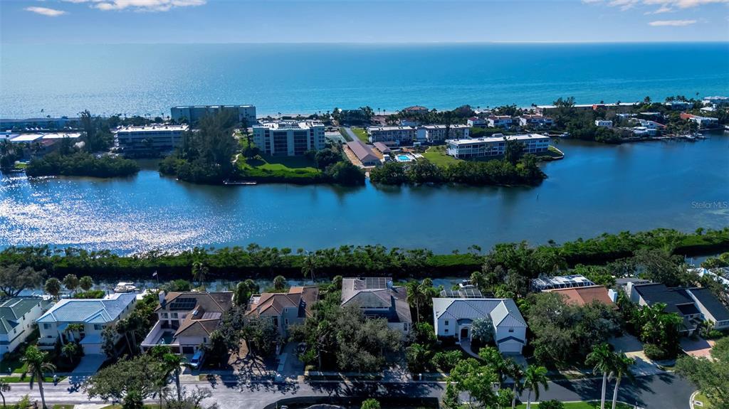 3361 Bayou Sound Longboat Key, FL 34228 - Photo 9 of 41 an aerial view of city and lake with boats and trees all around