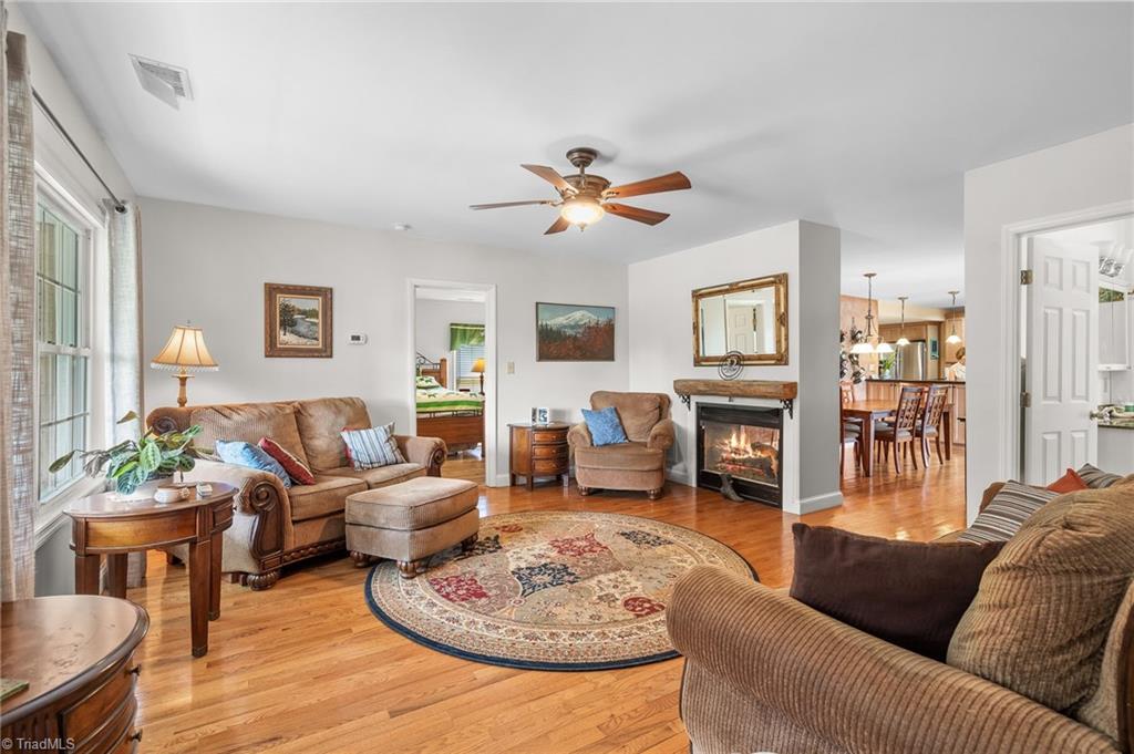 6421 Alamance County Line Road Liberty, NC 27298 - Photo 7 of 29 Living room with double sided FP