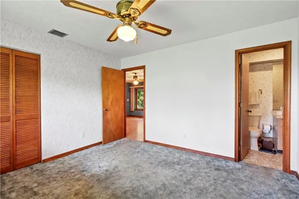 $595,000 | 903 Southwest Willow Lane, Palm City, FL 34990