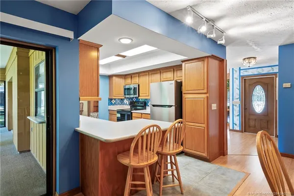 $595,000 | 903 Southwest Willow Lane, Palm City, FL 34990