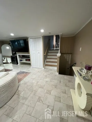 a kitchen with stainless steel appliances granite countertop a sink and a stove