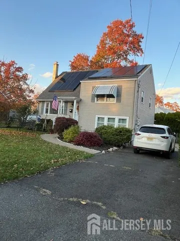 a car parked in front of a house
