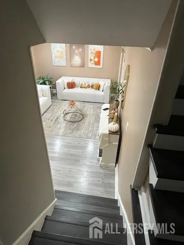 a view of entryway and kitchen
