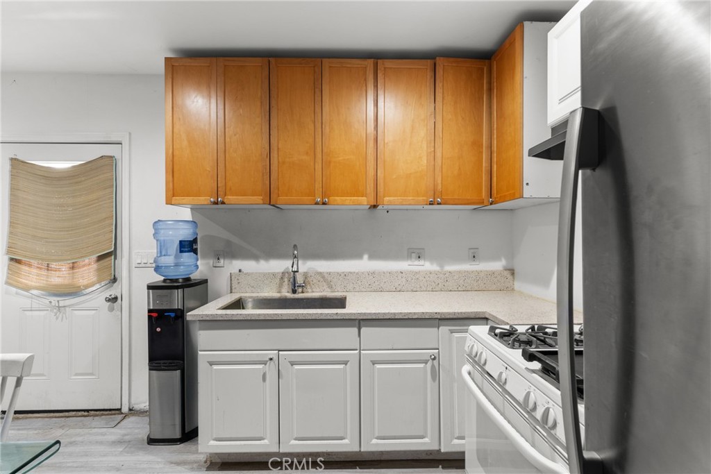 20006 Vanowen Street Winnetka, CA 91306 - Photo 22 of 29 ADU's kitchen