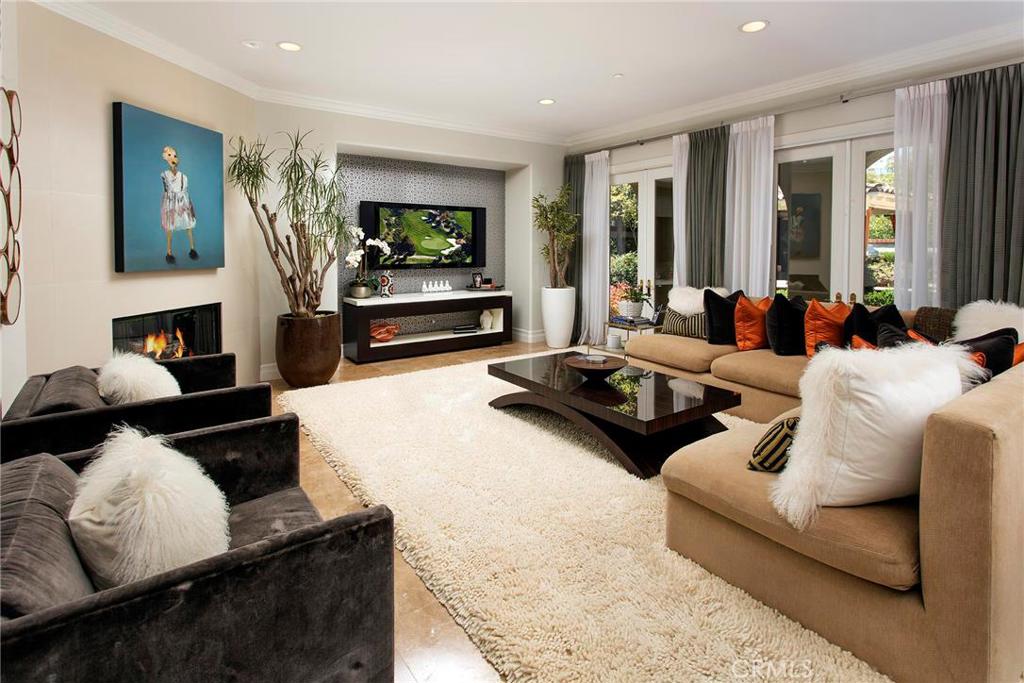 2395 Horizon Way Tustin, CA 92782 - Photo 11 of 43 a living room with furniture and a flat screen tv