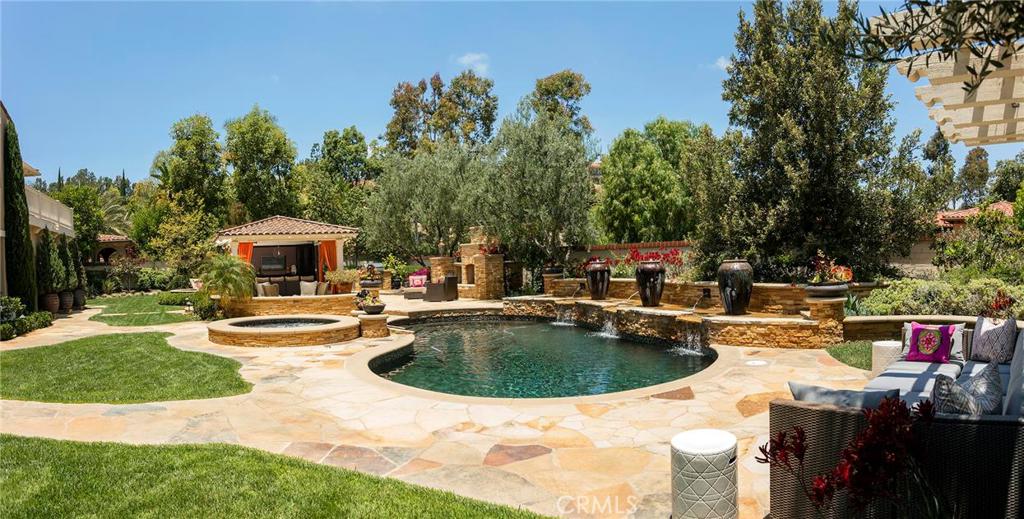 2395 Horizon Way Tustin, CA 92782 - Photo 14 of 43 a view of a house with swimming pool and sitting area