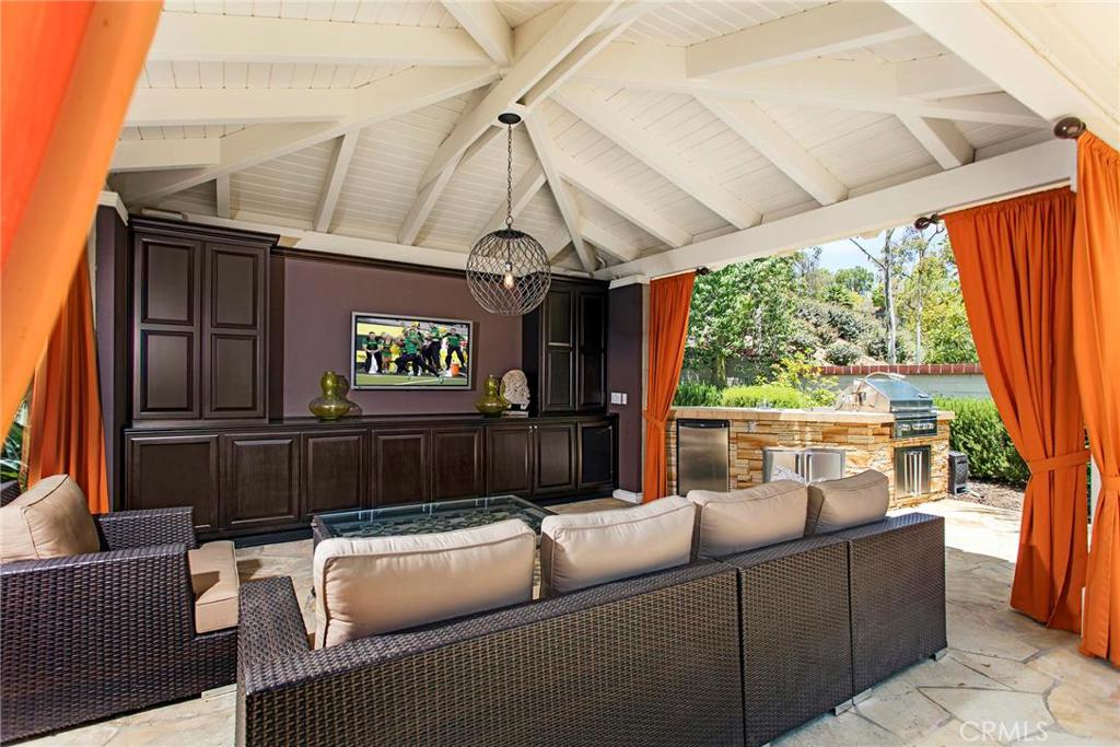 2395 Horizon Way Tustin, CA 92782 - Photo 15 of 43 a living room with furniture and a flat screen tv