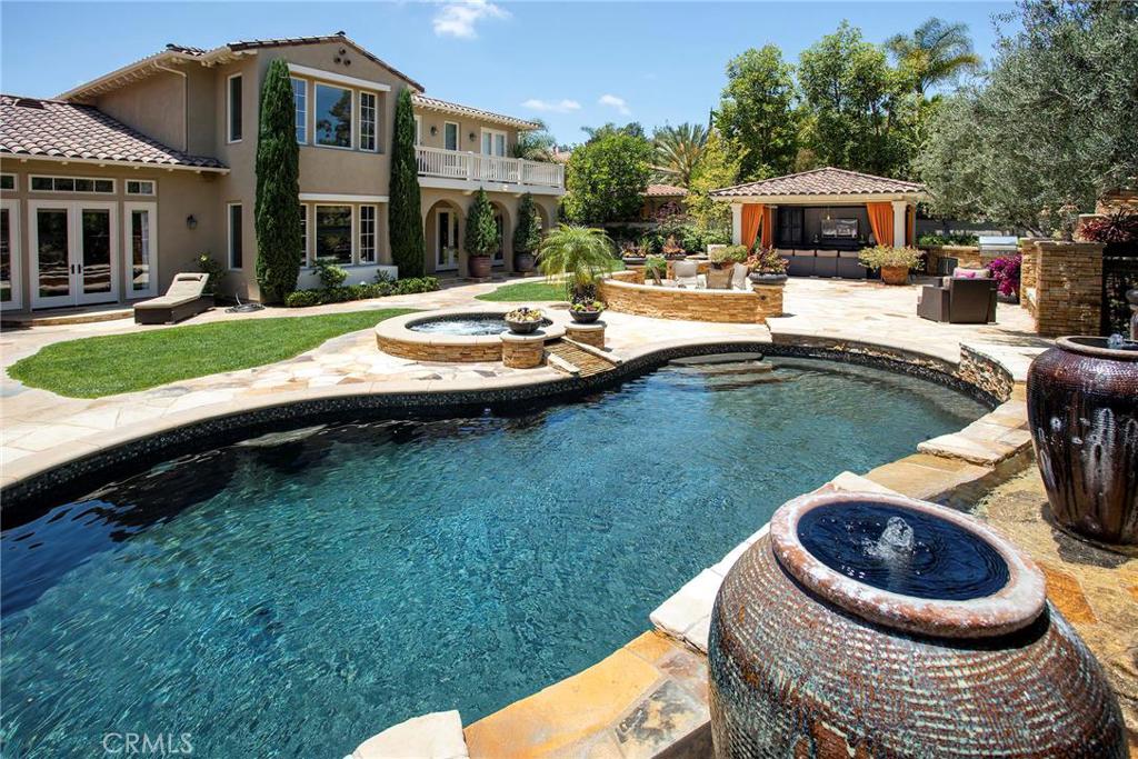 2395 Horizon Way Tustin, CA 92782 - Photo 17 of 43 a view of a house with pool and chairs