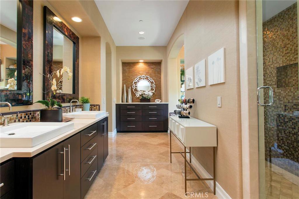 2395 Horizon Way Tustin, CA 92782 - Photo 22 of 43 a en suite bathroom with a sink double vanity and a mirror