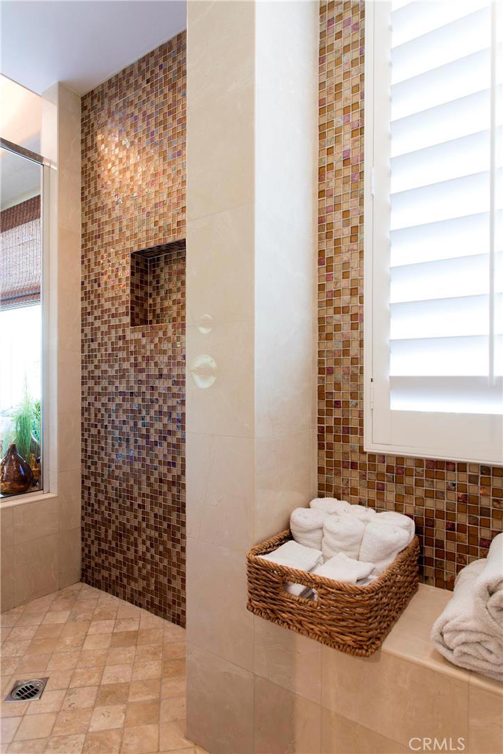 2395 Horizon Way Tustin, CA 92782 - Photo 25 of 43 a bathroom with a granite countertop sink and a bathtub