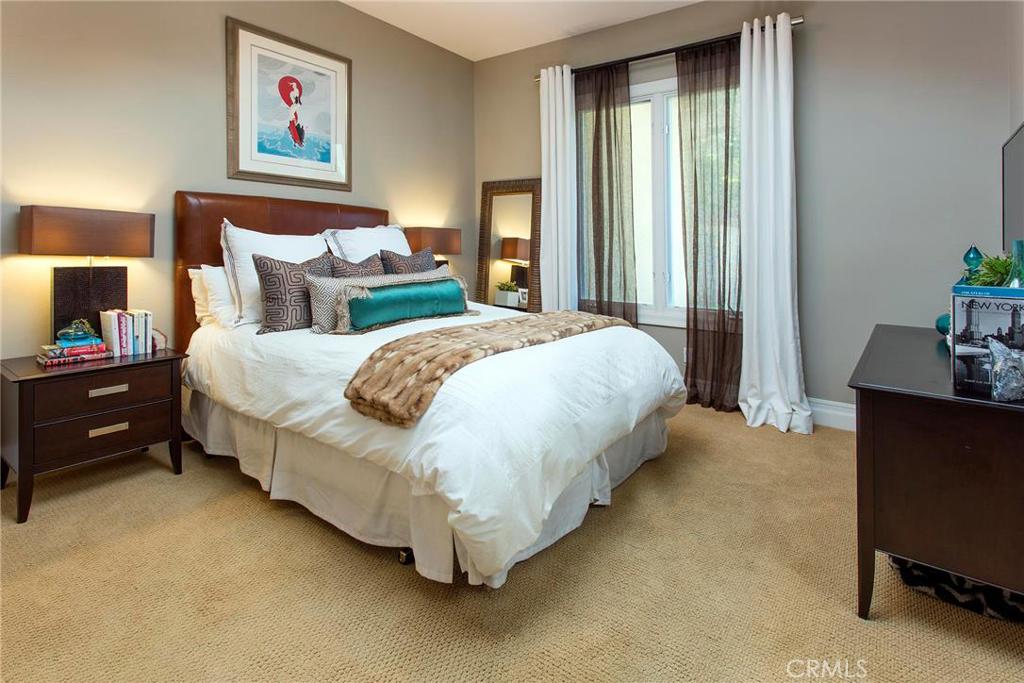 2395 Horizon Way Tustin, CA 92782 - Photo 28 of 43 a bed sitting in a bedroom next to a window