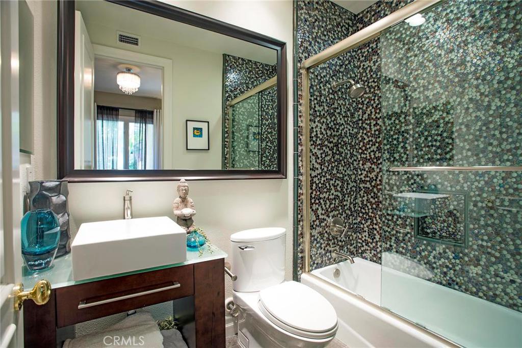 2395 Horizon Way Tustin, CA 92782 - Photo 29 of 43 a bathroom with a sink a toilet and shower