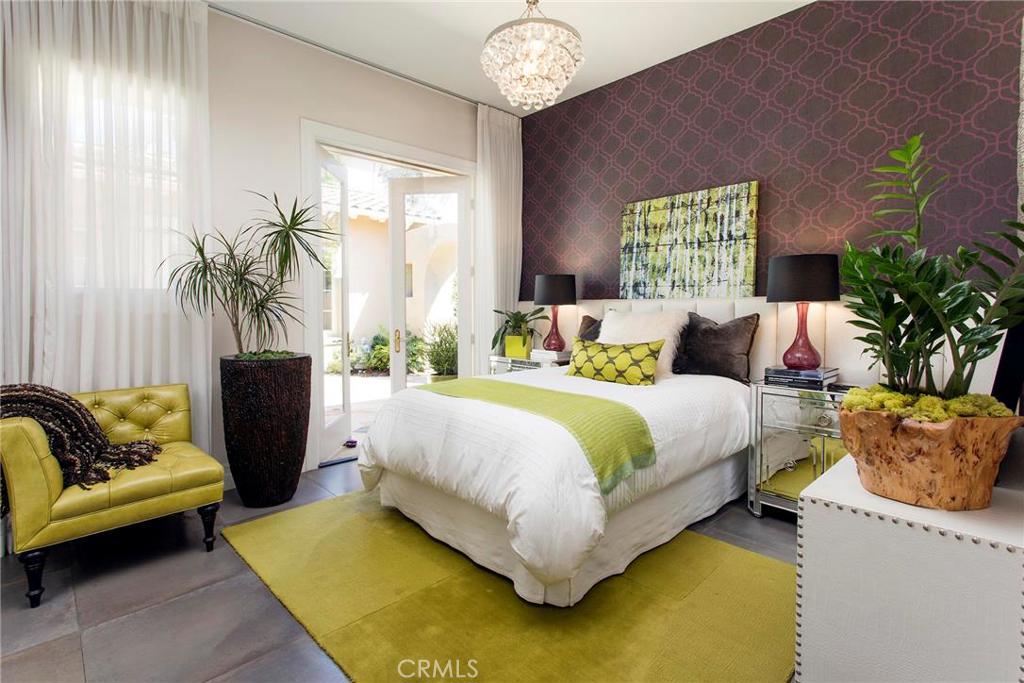 2395 Horizon Way Tustin, CA 92782 - Photo 30 of 43 a bedroom with a bed and a couch