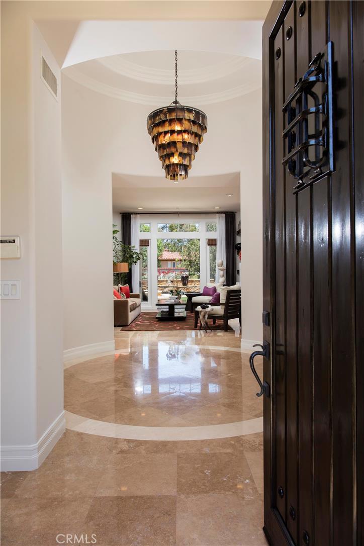 2395 Horizon Way Tustin, CA 92782 - Photo 3 of 43 a view of living room with furniture and a chandelier