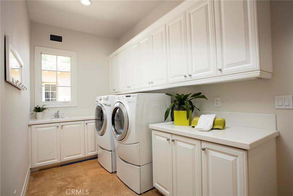 2395 Horizon Way Tustin, CA 92782 - Photo 32 of 43 a utility room with sink dryer and washer